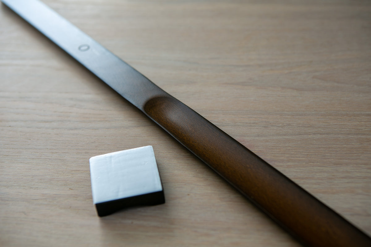 Skohorn med magnetisk veggfeste